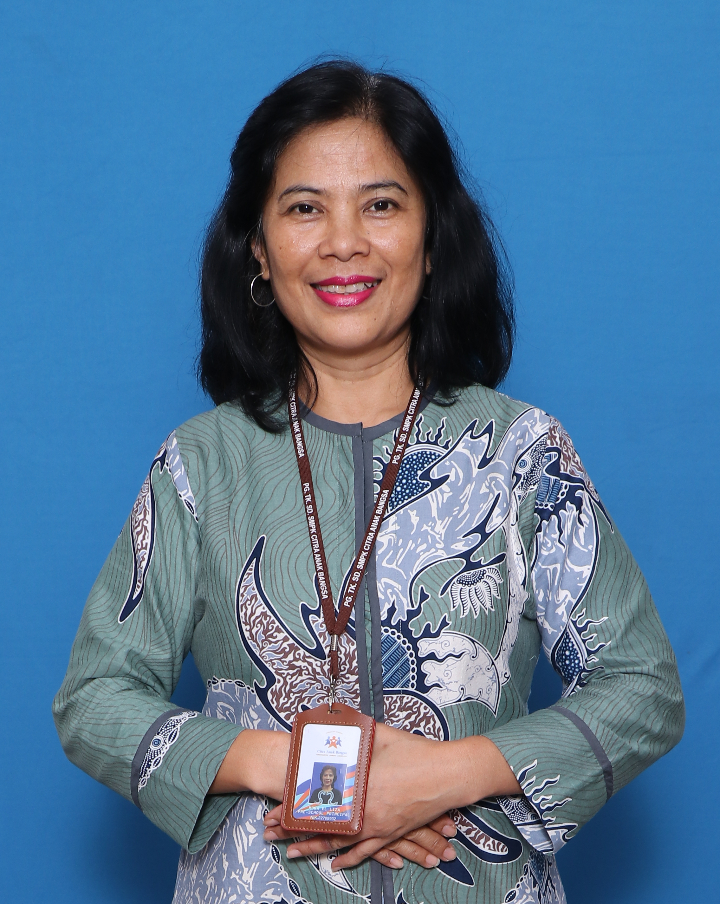 Mrs. Mona M.Pd - Wali Kelas 1A